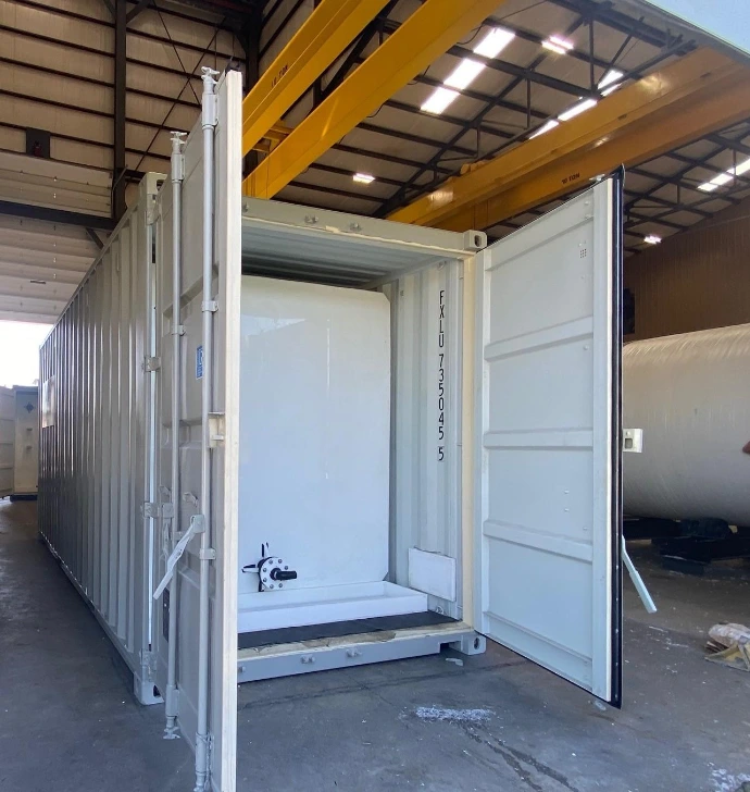 18,000 gallon double-wall acid tank in container